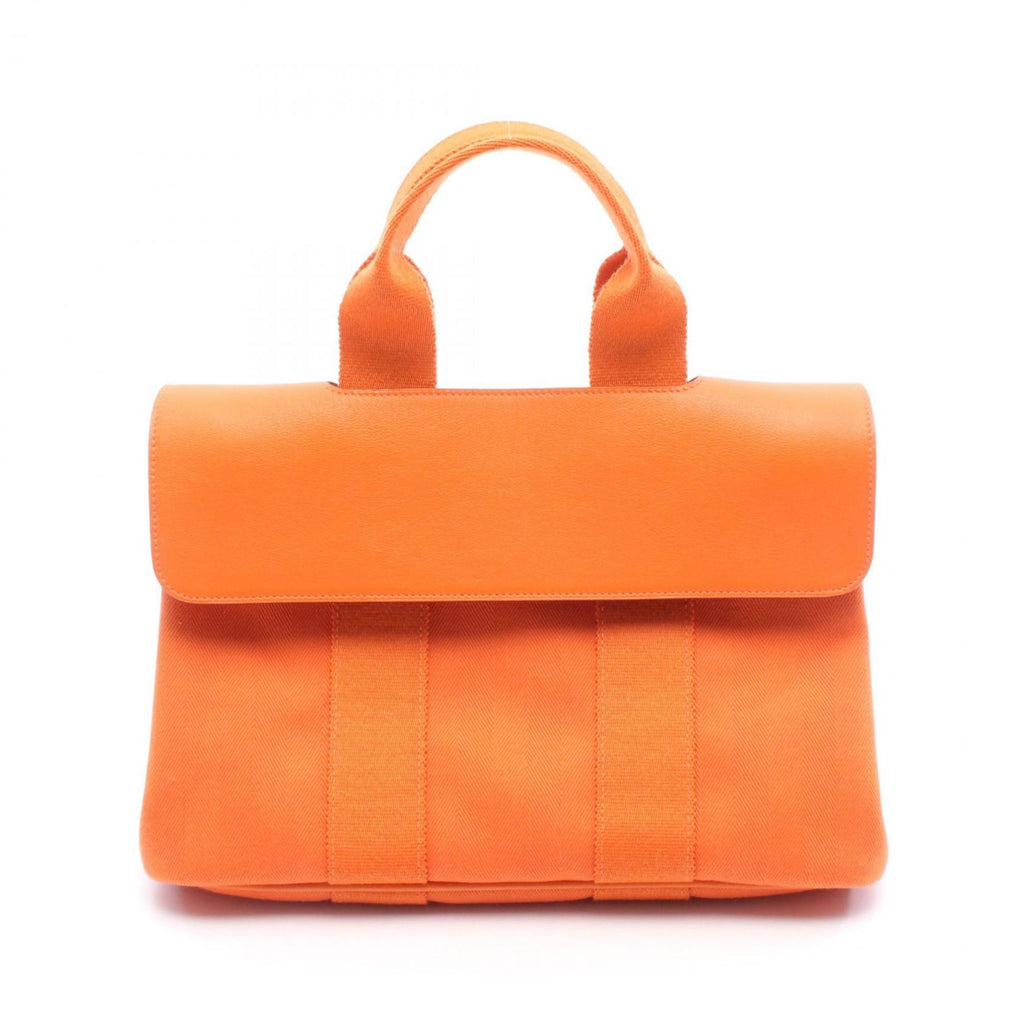 HMS Hermès Valparaiso PM handbag in leather and canvas with Toile Chevron detailing, orange.