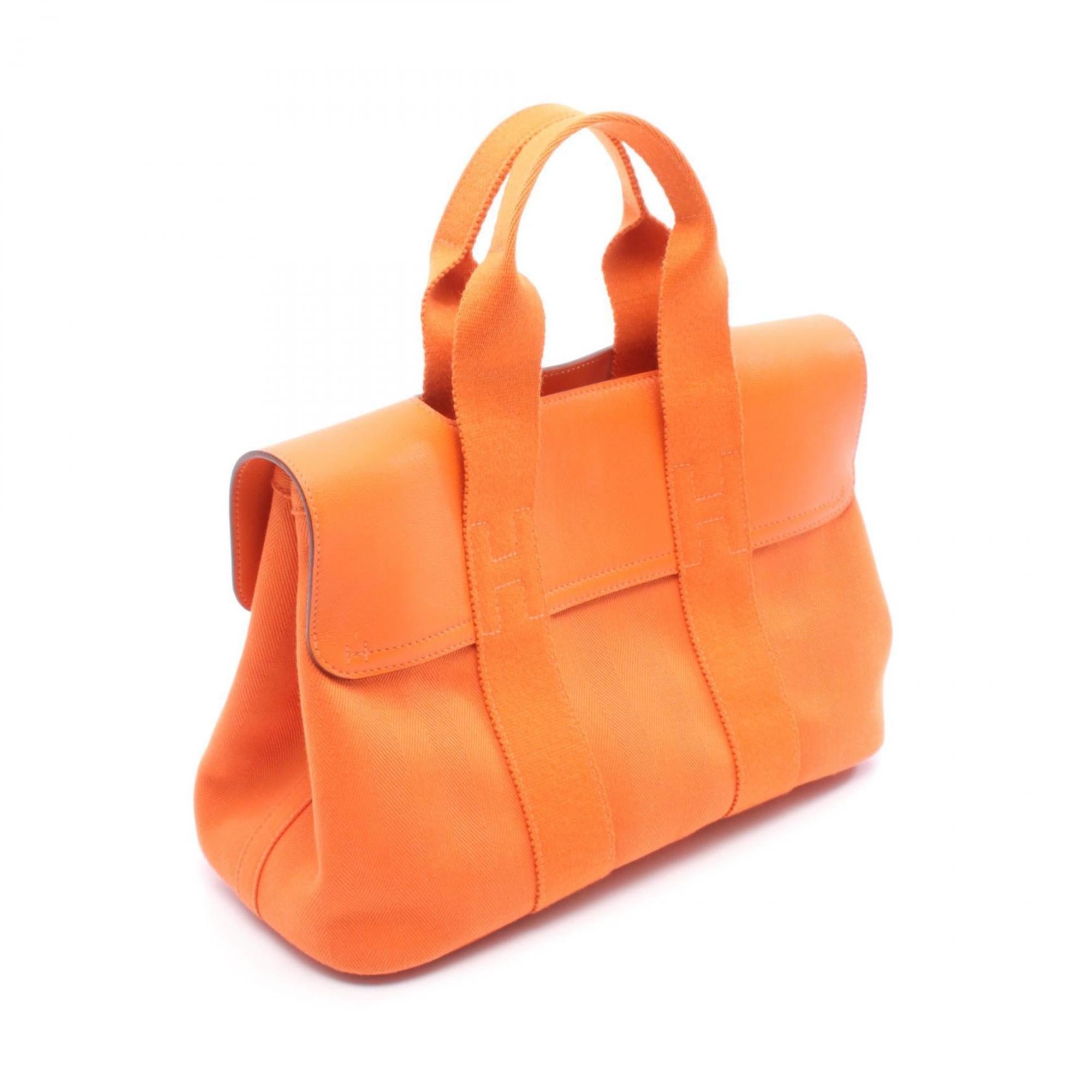 HMS Hermès Valparaiso PM handbag in leather and canvas with Toile Chevron detailing, orange.