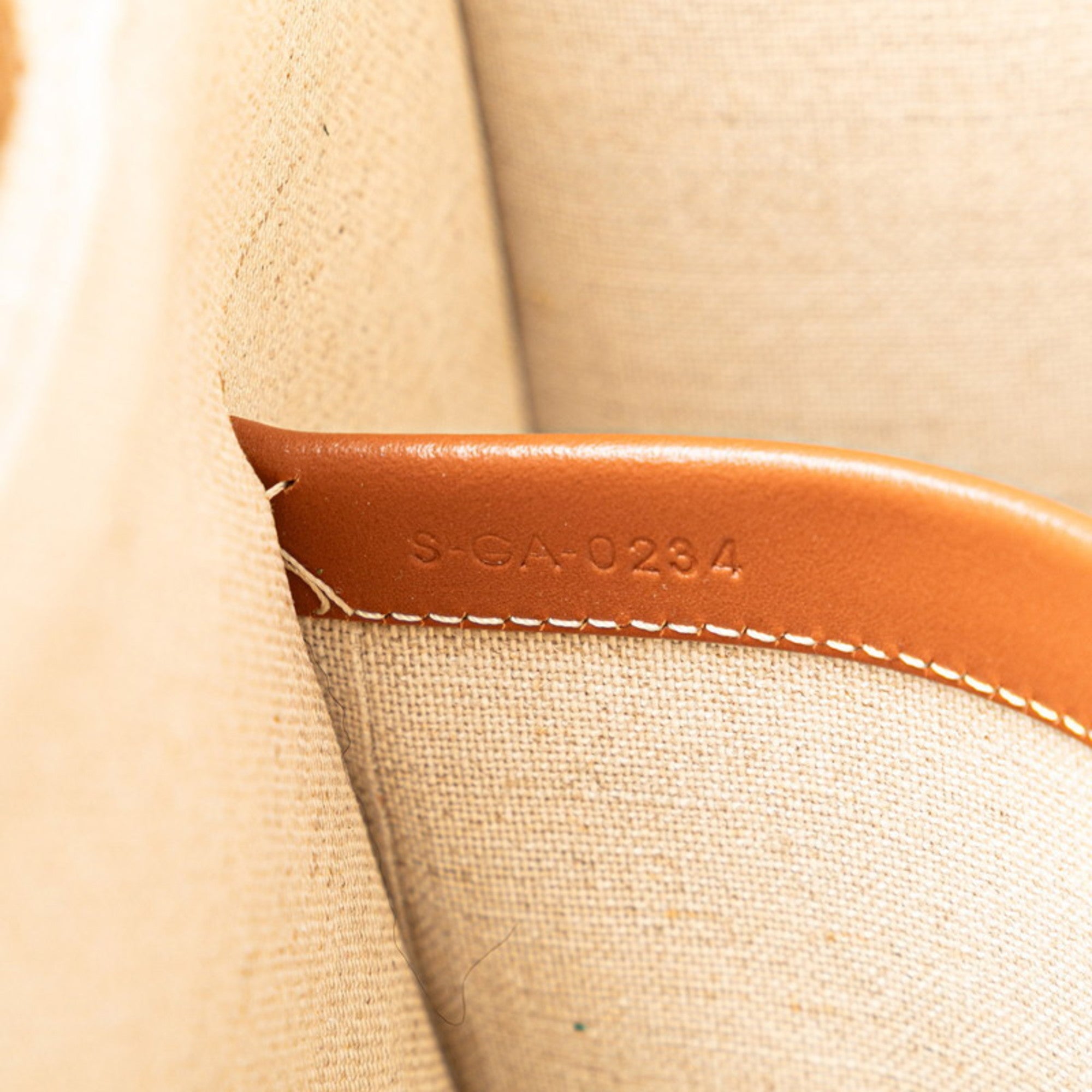 CLNI logo handbag tote bag in white, brown, and black canvas leather. Women's.