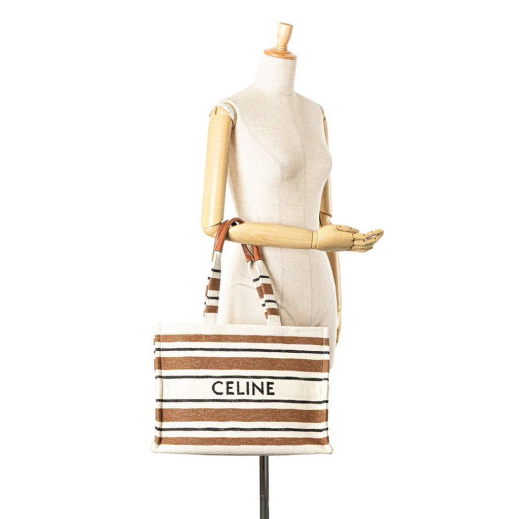 CLNI logo handbag tote bag in white, brown, and black canvas leather. Women's.