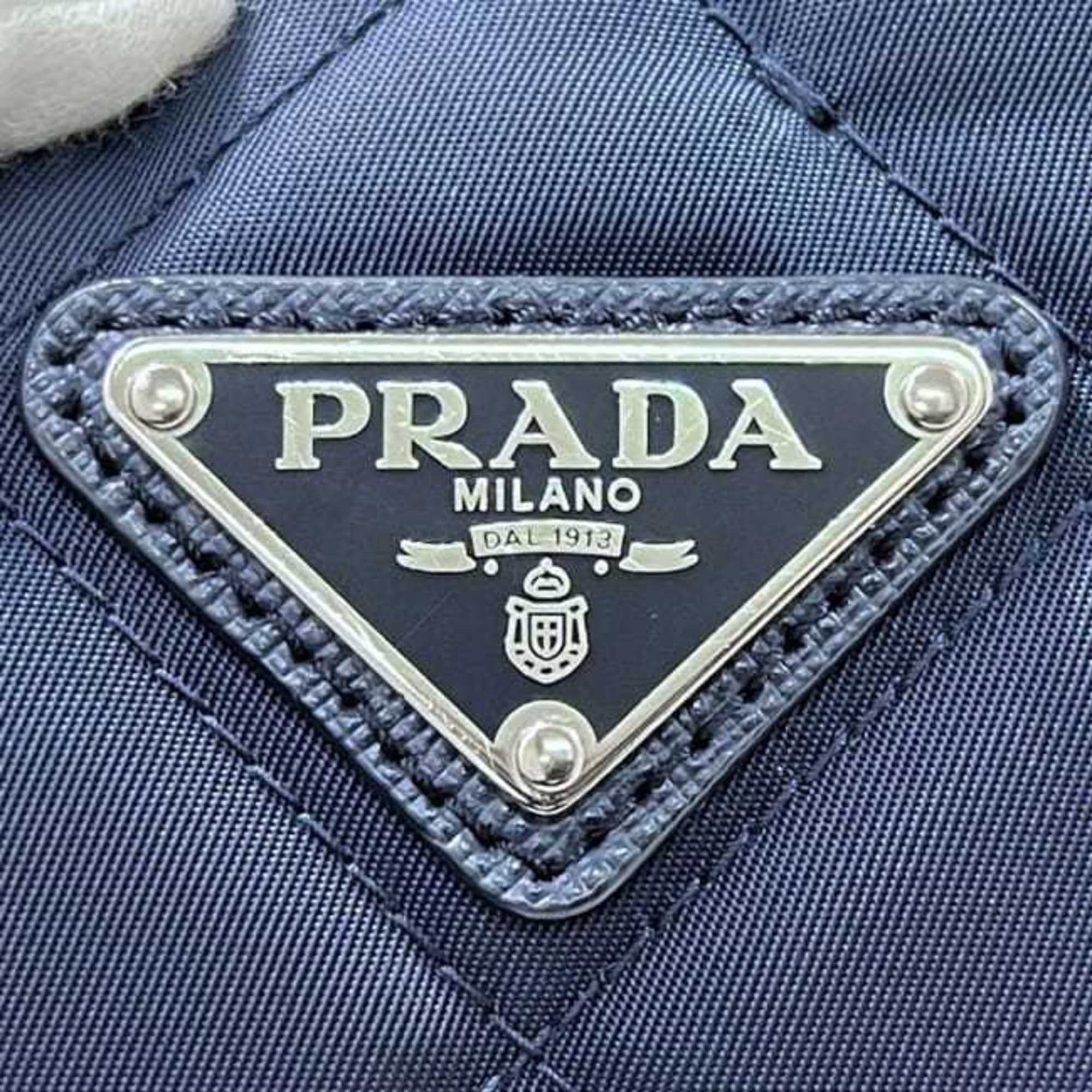 PDA 2-way bag f-24442, navy Tessuto 1BG740 tote in nylon and Saffiano leather. 165 PRADA shoulder bag, chain with triangular plate design, quilted.