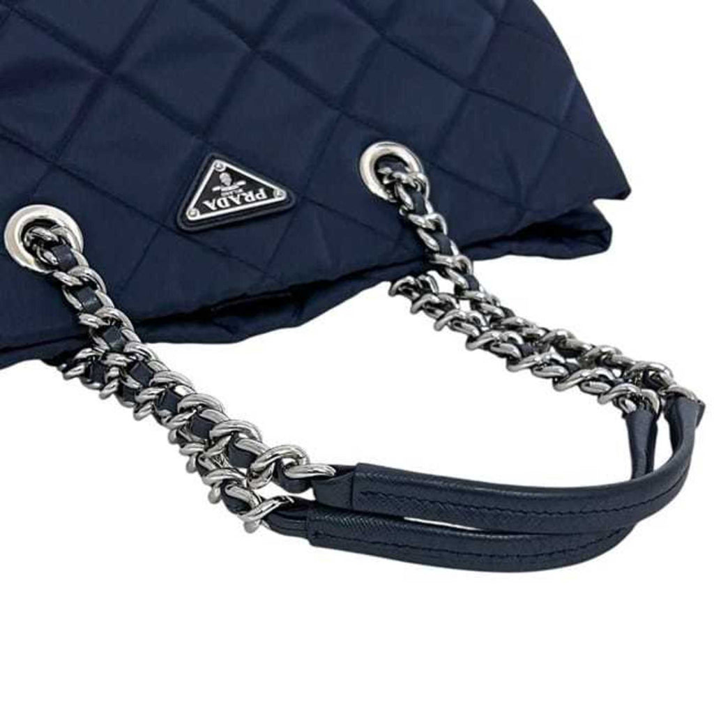 PDA 2-way bag f-24442, navy Tessuto 1BG740 tote in nylon and Saffiano leather. 165 PRADA shoulder bag, chain with triangular plate design, quilted.
