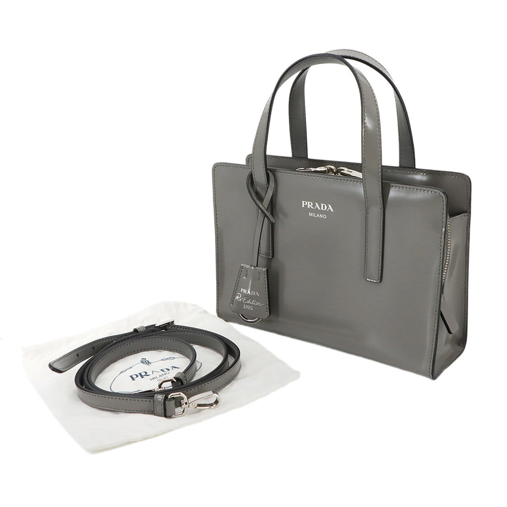 PDA Re-Edition 1995 2-Way Hand Shoulder Bag in Gray Leather with Silver Hardware (1BA357)